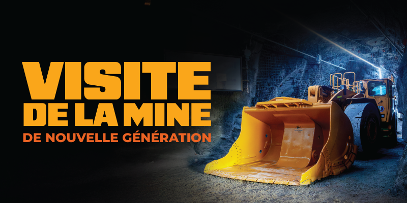 Visuel promotionnel montrant une grande chargeuse minière jaune dans un tunnel sombre aux parois rocheuses. Le texte orange indique « Visite de la mine de nouvelle génération ».