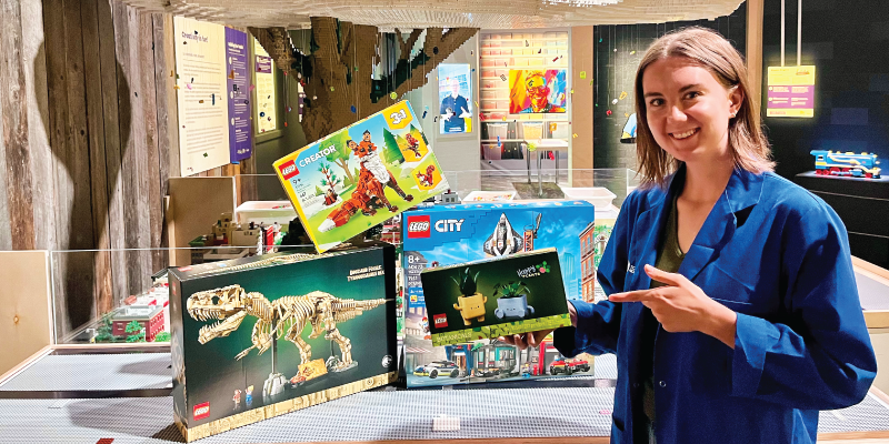 bluecoat next to several lego® prizes