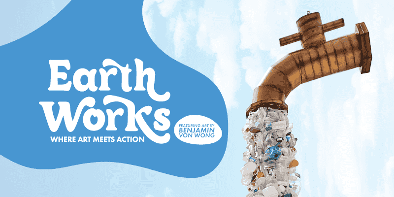 Wide promotional banner for Earth Works: Where Art Meets Action. The design features a large, rusted metal water pipe angled downward, pouring a stream of plastic waste such as bottles and containers instead of water. The background shows a bright blue sky with soft clouds. The title “Earth Works” appears in large white lettering on the left, with smaller text reading “Where Art Meets Action” and “Featuring art by Benjamin Von Wong.”